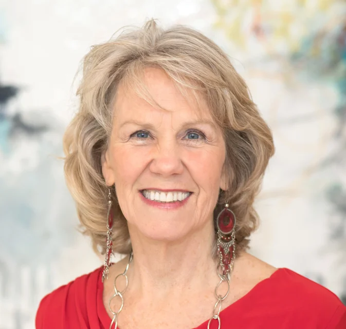 Anodea Judith with red blouse